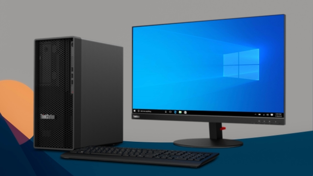 Lenovo Thinkstation tower workstation and monitor on blue background